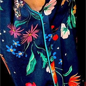 Room service lounge pants with multicolored flowers & butterflies.